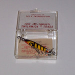 This lure is in a hard plastic box. It is a Race Horse in color # 5 Yellow with Black Stripes.