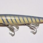 F-200 Devils Horse in a color I have never seen before. It is White with Blue Stripes. It came in a 1" 2 piece cardboard box that was stamped... F-222 Devils Horse. The 1963 J.T. Lloyd wholesale catalog lists color #19 as Blue Stripper.