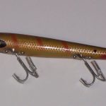 F-300 Devils Horse - Color: #12 Chinkapin Bream. The F-300 Devils Horse lure has a wood blank that is 5 1/2" long and they have three treble hooks, heavier hook hangers and large pointed spinners on each end.
