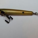 C-1000 Toothpick V1, Devils -
This is one of the earliest Devils Toothpicks I have seen. It is stamped Devils Toothpick. It is longer than the Toothpicks you usually see. The usual ones are 2 3/4" long. This one is 3" long. It also comes in #8 Shad. The hardware is different. It does not has a ball weight. The hooks are different sizes. This is what I call a version 1 Toothpick.