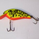 CD-1000 Rattl'n' Balsa Jack - 1/2 oz
This is the largest size Balsa Jack. It is from the earliest batches of Balsa Jacks that were made. The lip one this lure is made from a plastic printed circuit board. Later they used a slightly smaller plastic lip when they were put into mass production.
