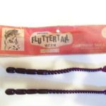 Fluttertail Worm Series
This is one of the "Fluttertail Worm" series. It is a 7" worm in Grape. I have one in the 10 pack and one in a 20 pack. The body and the tail is unusual on this one. I do not find a picture of this body or tail design in the Smithwick or Championship catalogues. The header card carries both the Smithwick name and the Championship Tackle name. See additional information on this worm under the description for the Lucky "E" Strike Baby Huey Worm listing.