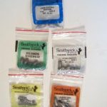 Smithwick brand Sinkers.
Smithwick brand sinkers first show up in the 1978 catalog and discontinued in the 1984 catalog. This grouping contains: Size 6 Bass Casting Sinkers, Size 0 Rubber Grip Sinkers, Size 10 Egg Sinkers, Size 6 Pinch Sinkers, and Size 0 Worm Sinkers.